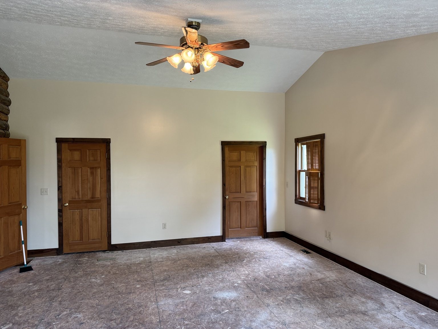 Freshly painted room with stained wood trim